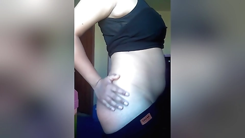 Hot brunette in stockings making a solo porn video