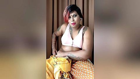 Tattooed redhead shows off her sexy body on webcam