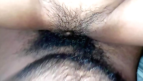 Busty Indian brunette in a white dress and stockings