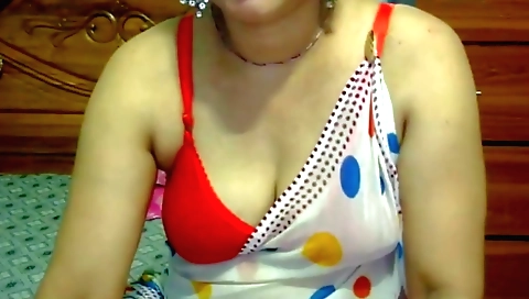 Indian brunette masturbates herself in the bedroom