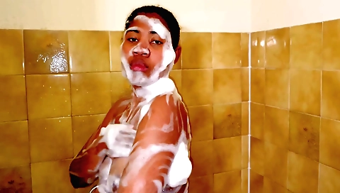 Brunette girl with shaved pussy spreads her legs like an animal