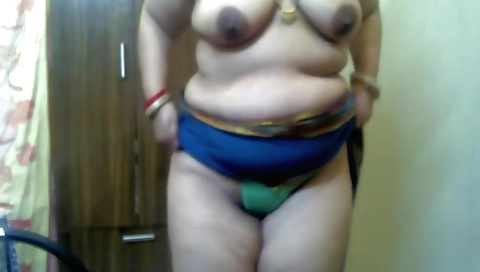 Chubby brunette in a nude body gets fucked on camera