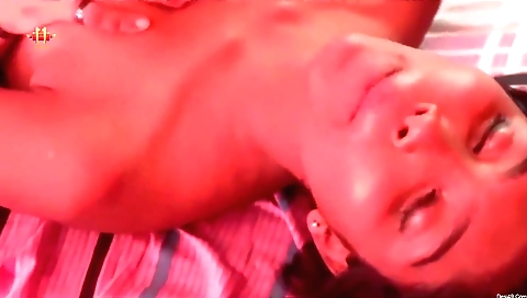 Hot brunette girl with short hair and big tits on a bed