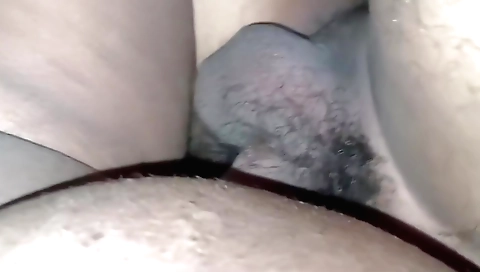 Two women and a man are in a bedroom with each other