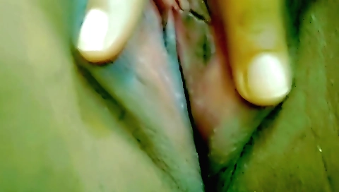 A hot brunette with a beautiful body shows an awesome body