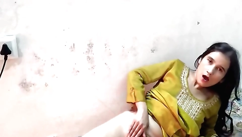 Indian girl masturbating while standing on her knees