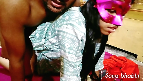 Brunette in black clothes and on a white bed is fingering