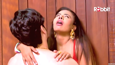 Stunning brunette babe in a bikini standing in front of you