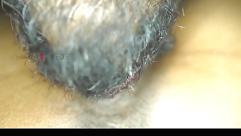 A close up video of a couple fucking in the bedroom