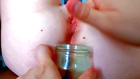 Indian guy gives him to drink some chai from hot chick