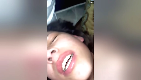 Indian brunette in black hair and a nice face sitting on face