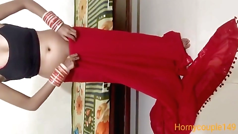 Indian brunette babe wearing a white dress in her home