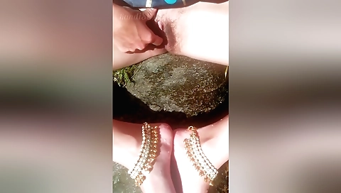 Hot amateur blonde in red bikini masturbating outdoors