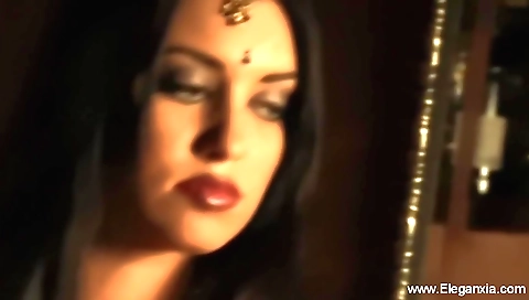 Sexy brunette girl in white dress and stockings in solo