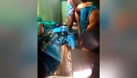 Brunette Indian aunty shows her pussy in the bathroom