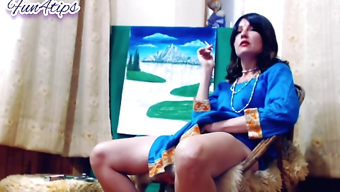 Indian brunette smoking with a hot smile in solo webcam