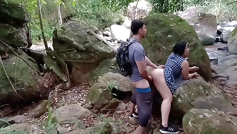 Big tits brunette girl rides a black dude in forest