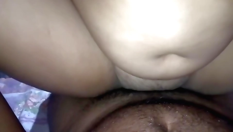 Hairy girl has an erotic face and is riding her big cock