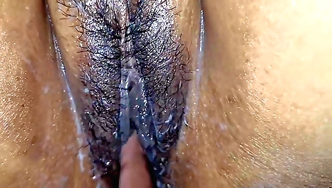 Busty girl in stockings is getting fucked by a big dildo